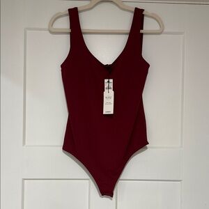 Express burgundy bodysuit NWT sz M